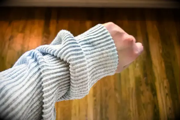 A close up of the sleeve of the Alo Muse Hoodie