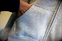 Photo of the pocket of Aritzia Cozy Sweatfleece Boyfriend Boxy Zip Hoodie