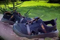 Teva Men’s Outflow CT Sandals on porch railing