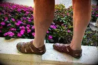 A person walks outside while wearing the PIKOLINOS Men