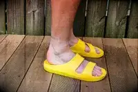 A side view of a person wearing the Bombas Men