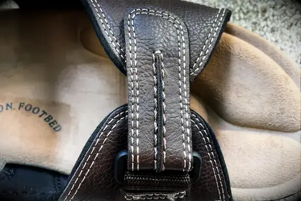 The strap on the top of the Dockers Men