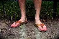 Person wearing Olukai Tuahine Flip Flop