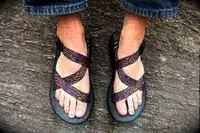 A person wearing the Chacos Z Cloud Sandal