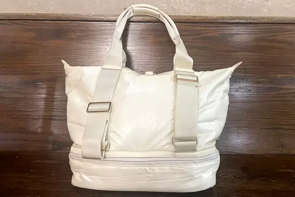 Caraa Sport Tote against a wood background