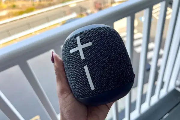 A person holds up the Ultimate Ears Wonderboom 3