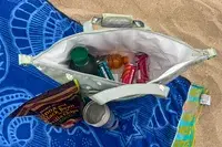 Drinks inside the Calpak Insulated Soft-sided Cooler