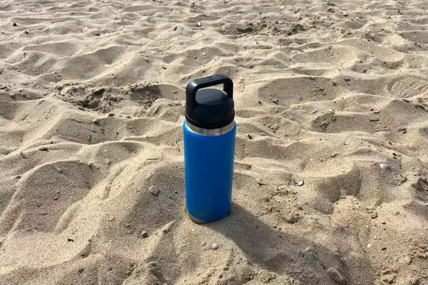 Yeti Rambler placed in the beach