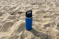 Yeti Rambler placed in the beach