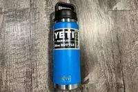 Yeti Rambler placed on the wooden floor