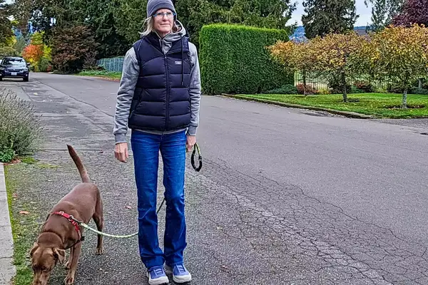 A person walks outside while wearing the L.L. Bean Women