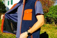 A person holds open the Fjallraven Men’s Vardag Pile Fleece Vest