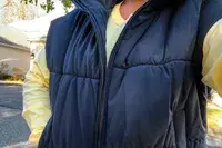 The zipper on the front of the Alo Incline Puffer Vest