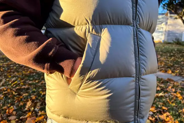 A person with their hand in the pocket of the Eddie Bauer Men