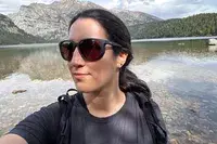 Someone wearing a pair of sunglasses