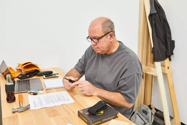 Person holding Leatherman Wave Multi-tool