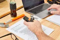 Person holding Leatherman Wave Multi-tool