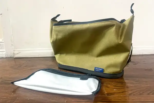 The Thule Aion Toiletry Bag on a table