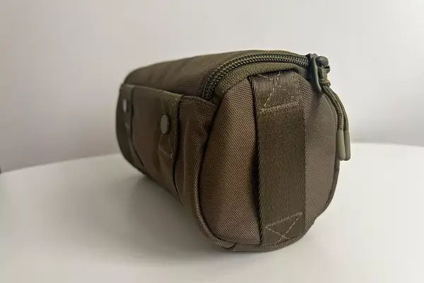 The side strap on the Dagne Dover Small Seoul Dopp Kit