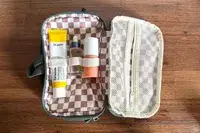 Makeup secured in the State Hart Toiletry Kit