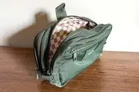 The State Hart Toiletry Kit open on a table