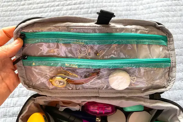 Jewelry and hygiene items stored in the BAGSMART Blast 4.5L Hanging Toiletry Bag