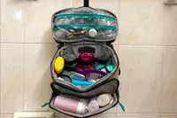 The BAGSMART Blast 4.5L Hanging Toiletry Bag hangs from a hook