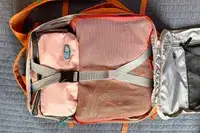 The BAGSMART Blast 4.5L Hanging Toiletry Bag packed into a suitcase