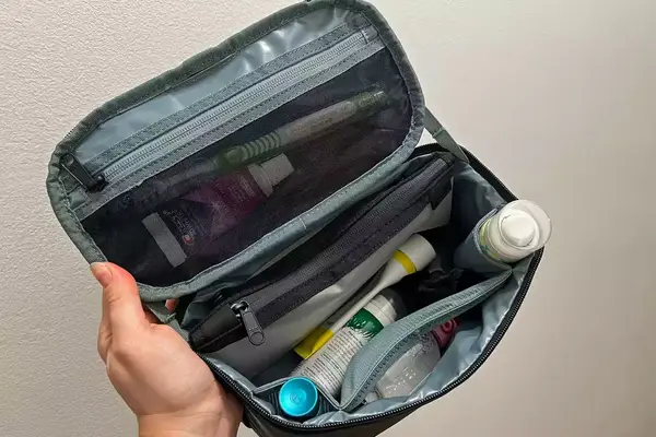The Thule Subterra 2 Toiletry Bag filled with toiletries