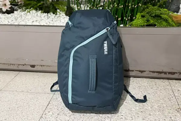 Thule RoundTrip Snowboard and Ski Boot Backpack 60L on tile