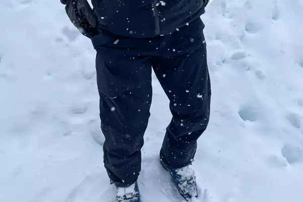 A person wears the Backcountry CrestCarver Men