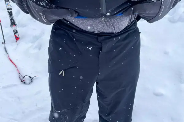 A person wears the Backcountry CrestCarver Men