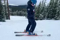 A person wears the Backcountry CrestCarver Men