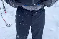 A person wears the Backcountry CrestCarver Men