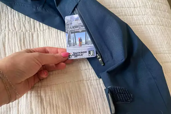 Photo of a ski pass pocket on the arm of a ski jacket