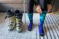 A person adjusting the Smartwool Women