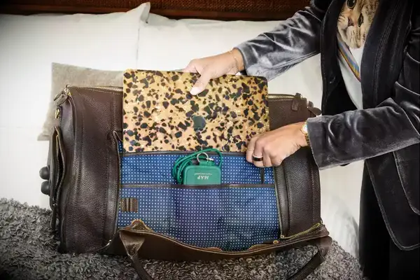 Eagle Creek 130L Cargo Hauler displayed upright on a wood floor