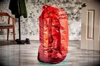 Eagle Creek 130L Cargo Hauler displayed upright on a wood floor