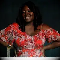 A person adding items to the REI Co-op Big Haul 34-inch Rolling Duffel