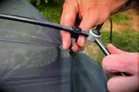 A person attaches the Sea to Summit Telos Freestanding Ultralight Tent to the base