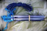 The stakes and cord for the Nemo Hornet Osmo Ultralight Backpacking Tent