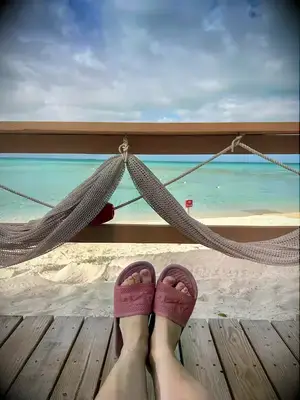 person on vacation with ocean in the background of cruise