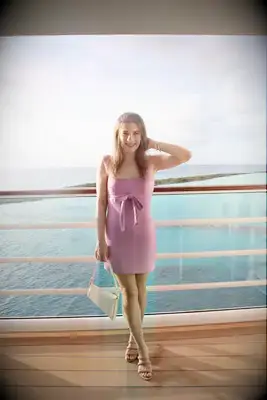 person on vacation with ocean in the background of cruise