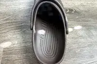 The pattern on the sole of the Crocs Classic Clogs
