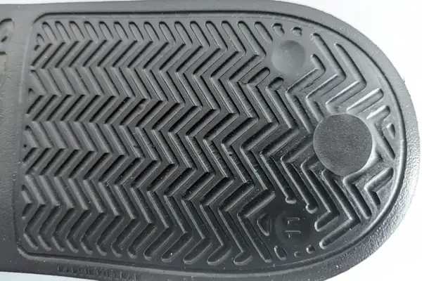 The treads on the bottom of the Adidas Men