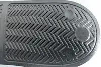 The treads on the bottom of the Adidas Men