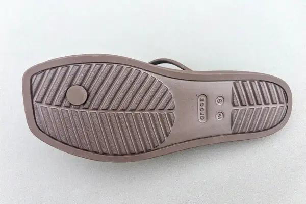 The treads on the bottom of the Crocs Miami Toe Loop Sandals