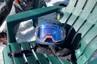 100 Percent Snowcraft Hiper Goggles on a chair