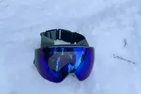 Smith I/O Mag Goggles laying in the snow