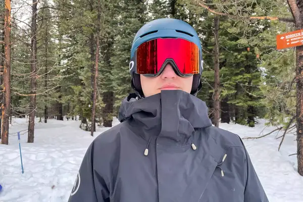 A person wearing the Oakley Line Miner Pro L Snow Goggles while skiing